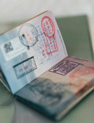 "An open passport showing multiple visa stamps, representing travel opportunities for Nigerians to visa on arrival countries in 2024 with Lery Hago Travels."