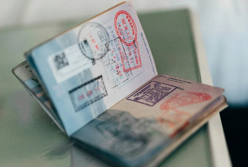 "An open passport showing multiple visa stamps, representing travel opportunities for Nigerians to visa on arrival countries in 2024 with Lery Hago Travels."