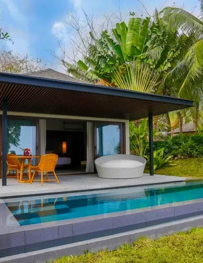 "Luxury private villa with a swimming pool surrounded by lush tropical greenery. Perfect for relaxation and comfort, offering the best type of accommodation when you travel."