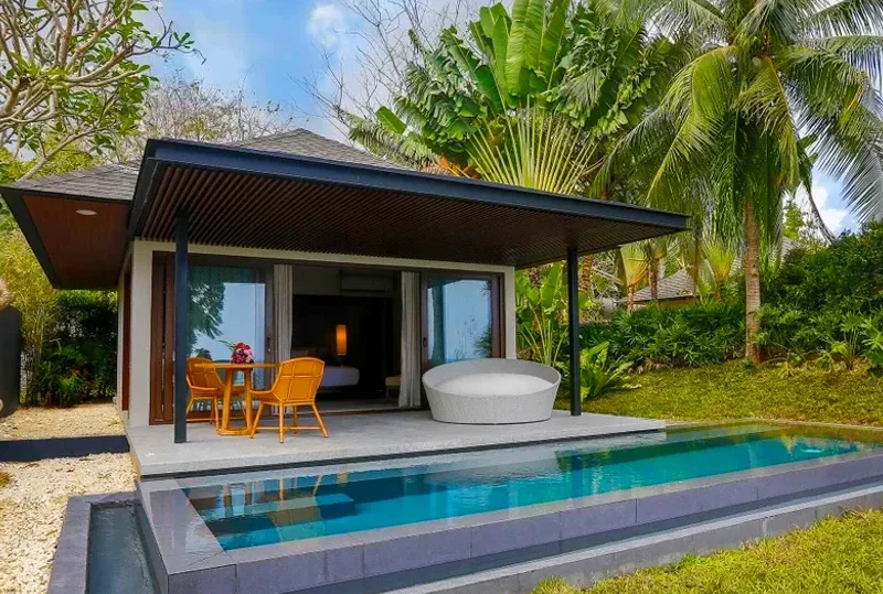 "Luxury private villa with a swimming pool surrounded by lush tropical greenery. Perfect for relaxation and comfort, offering the best type of accommodation when you travel."