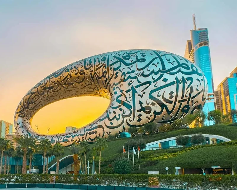 "Dubai Museum of the Future at sunset, showcasing its unique architecture with Arabic calligraphy, a landmark attraction in Dubai."