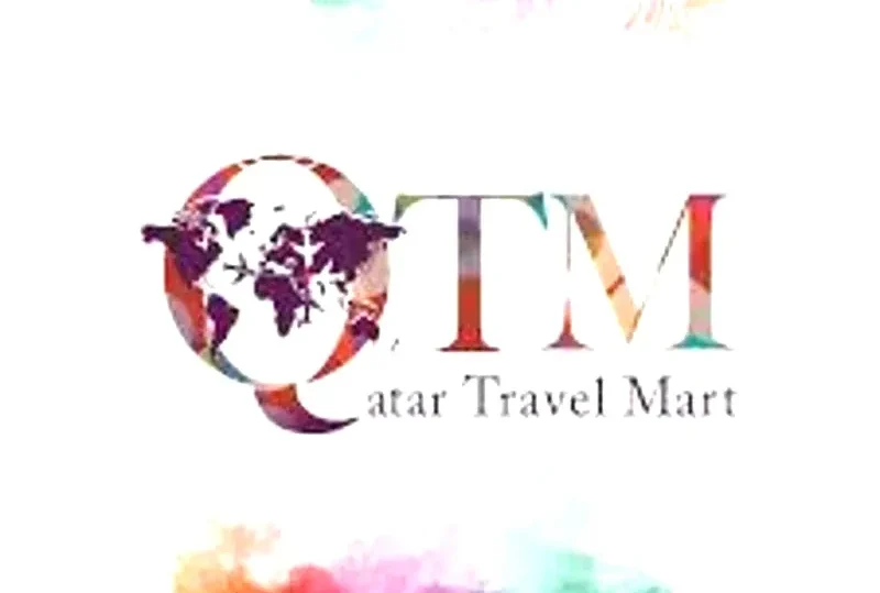 Logo of Qatar Travel Mart 2024 featuring a colorful world map and text highlighting global travel connections.