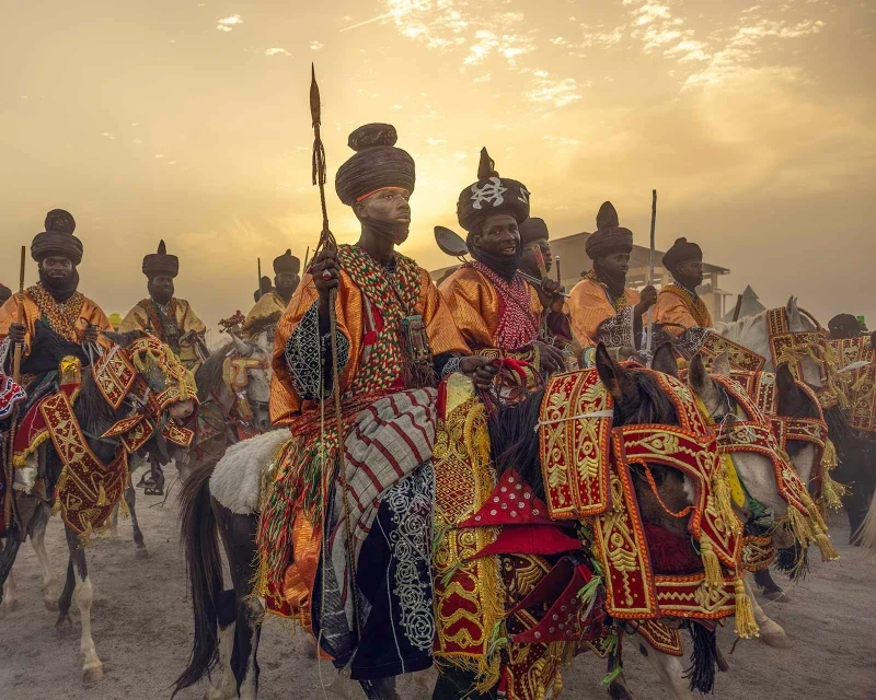 "Traditional horsemen dressed in colorful regalia at Nigeria's Grand Durbar, a UNESCO Cultural Heritage event, supported by Lery Hago Travels."