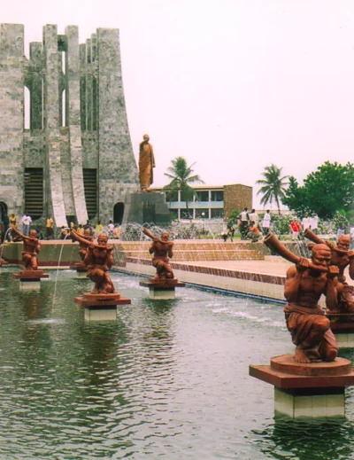 "Kwame Nkrumah Memorial Park in Accra, Ghana, showcasing fountains, statues, and the mausoleum surrounded by palm trees. Ghana approves visa-free travel for all Africans with Lery Hago Travels."