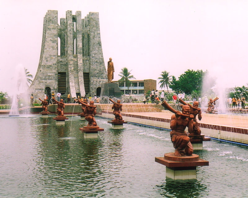 "Kwame Nkrumah Memorial Park in Accra, Ghana, showcasing fountains, statues, and the mausoleum surrounded by palm trees. Ghana approves visa-free travel for all Africans with Lery Hago Travels."