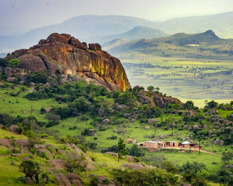 "A scenic view of the green granite hills and rural landscape in Eswatini, Southern Africa"