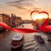 "A ribbon heart framing a sunset over the Venice Grand Canal, capturing the romantic essence of a Venice Valentine's Getaway - start your journey at www.leryhago.com."