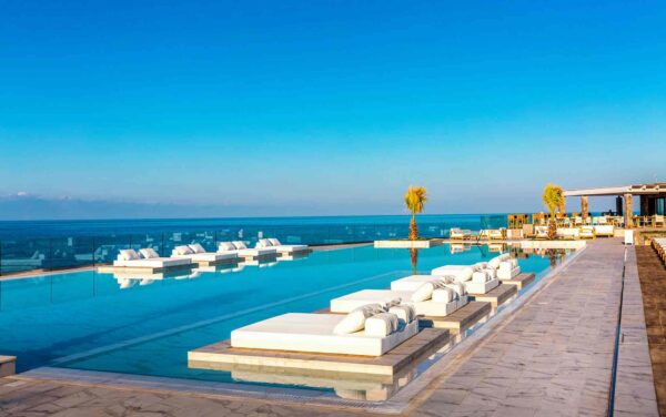 "Luxurious infinity pool with panoramic ocean views at Lisbon Cultural Getaway, a serene escape - leryhago.com"