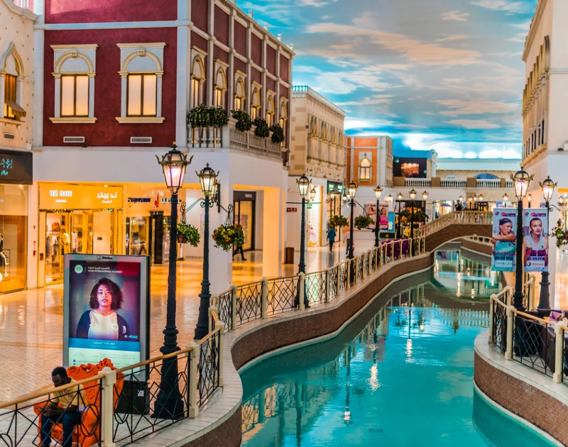 Villaggio Mall indoor canal and luxury shopping stores in Qatar