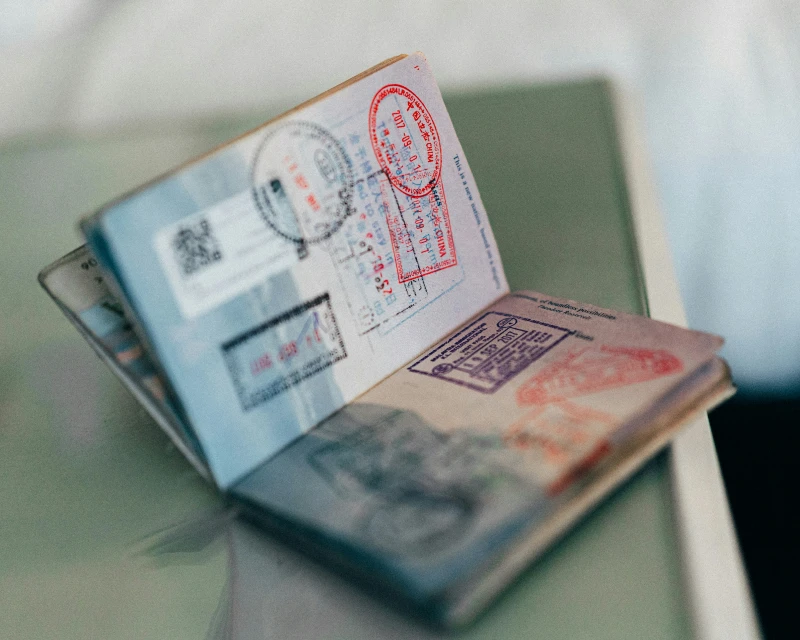 "An open passport showing multiple visa stamps, representing travel opportunities for Nigerians to visa on arrival countries in 2024 with Lery Hago Travels."